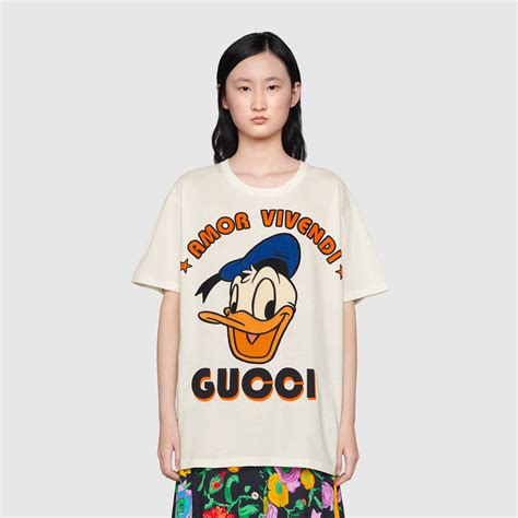 gucci donald duck fake t shirt|are gucci shirts real.